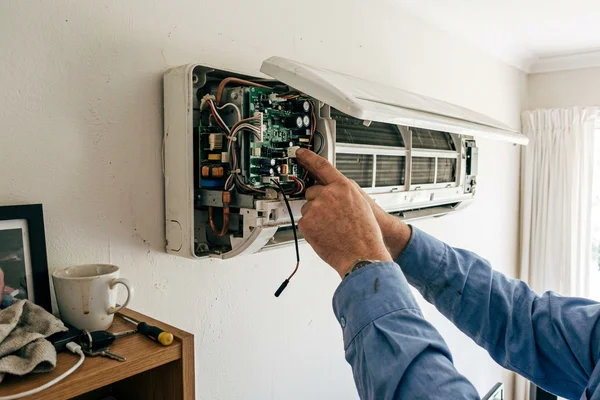 Indoor unit opened to check the PCB and thermistor sensor
